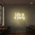 Sinal de néon Life is a Party